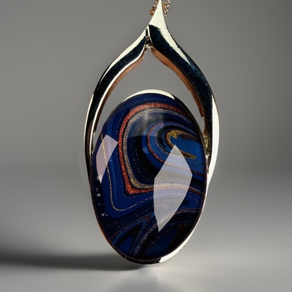 Jewelry - Elegant Blue Swirl and Silvertone Pendant Necklace